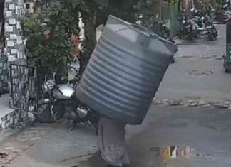 Woman miraculously escapes injury as water tank falls — Incredible video captured news-18102024-162748